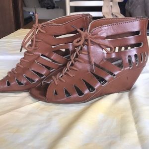 Faux leather, with cut outs/lace up wedges